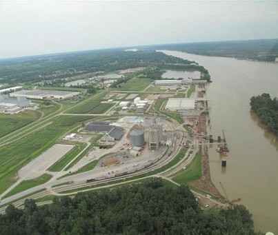Aerial view of an industrial site by a river